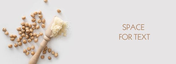 banner, dry chickpea beans scattered on white background, top view, close-up, empty space for text - Photo, Image