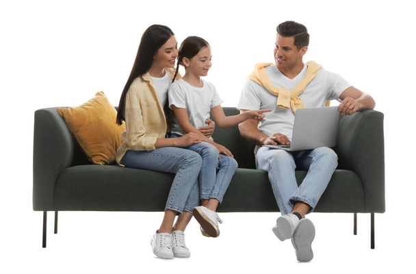 Happy family resting on comfortable green sofa against white background - Foto, imagen