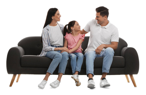 Happy family resting on comfortable grey sofa against white background - Foto, imagen