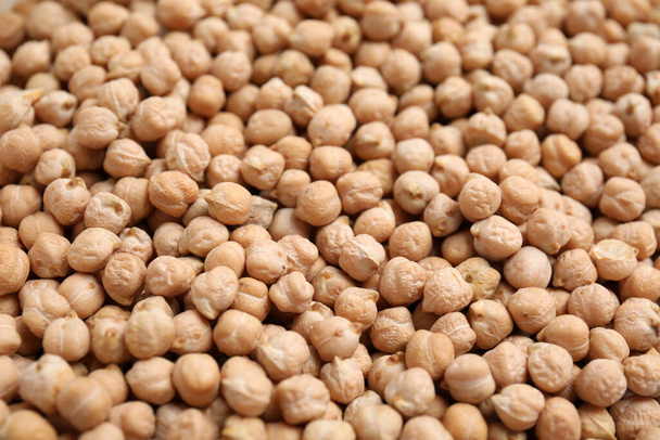 Heap of chickpea as background, closeup view. Veggie seeds - Foto, afbeelding