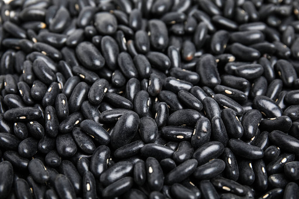 Heap of black beans as background, closeup. Veggie seeds - Photo, Image