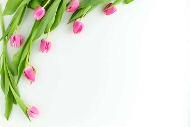 spring flat lay with tulips on table. - Фото, зображення
