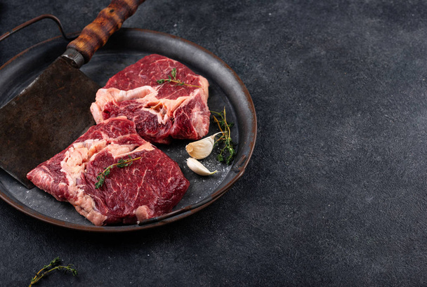 Raw uncooked rib eye steak - Фото, зображення