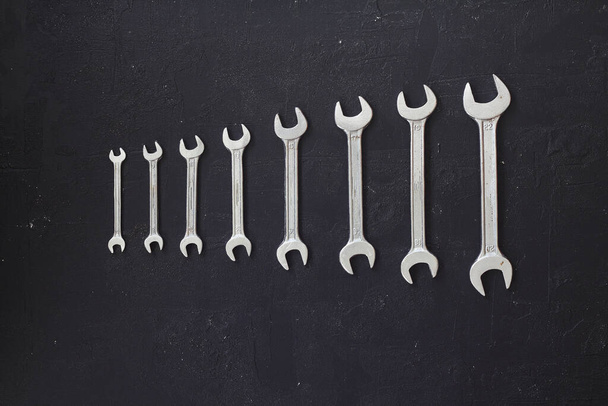 Spanners. Many wrenches. Industrial background. Set of wrench tool equipment. Set of wrenches in different sizes. Father's day, DIY, home improvement, or labor day background concept. - Foto, afbeelding