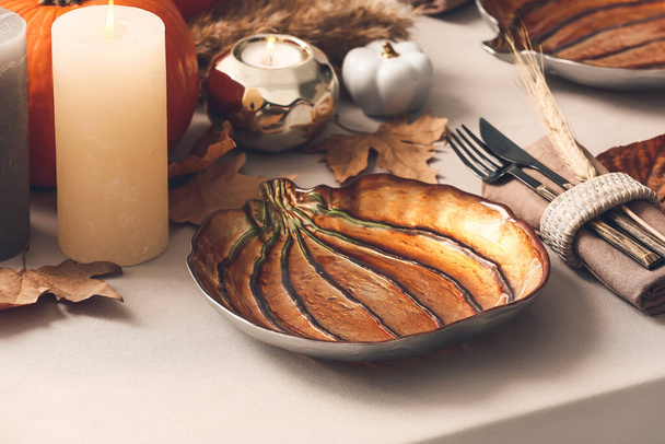 Beautiful table setting for Thanksgiving Day celebration on light background - Photo, Image