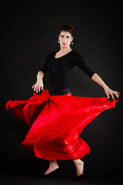 Dance. Spanish girl in red skirt dancing flamenco - Foto, Imagem