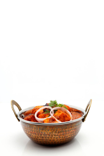Indian Food or Indian Curry in a copper brass serving bowl. - Foto, Imagen