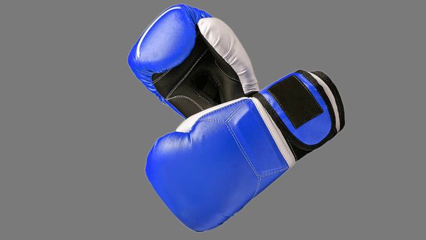 Boxing gloves close-up on an isolated gray background. Blue boxing gloves. - Fotó, kép
