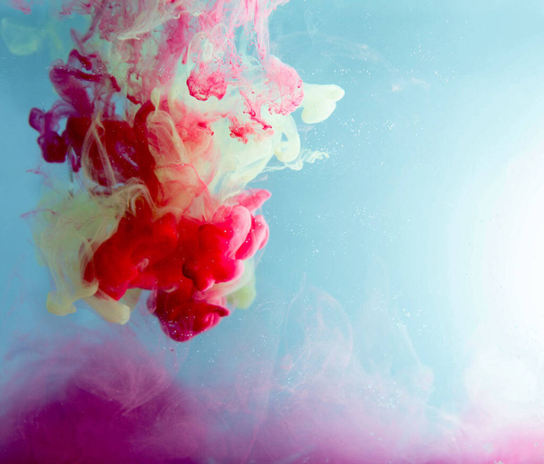 Motion Color drop in water,Ink swirling in ,Colorful ink abstraction.Fancy Dream Cloud of ink under water.Acrylic colors and ink in water. Abstract background - Photo, image