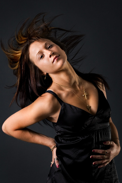 Young beautiful model flicking her hair - Photo, image