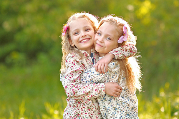 Portrait of two little girls twins - Фото, изображение
