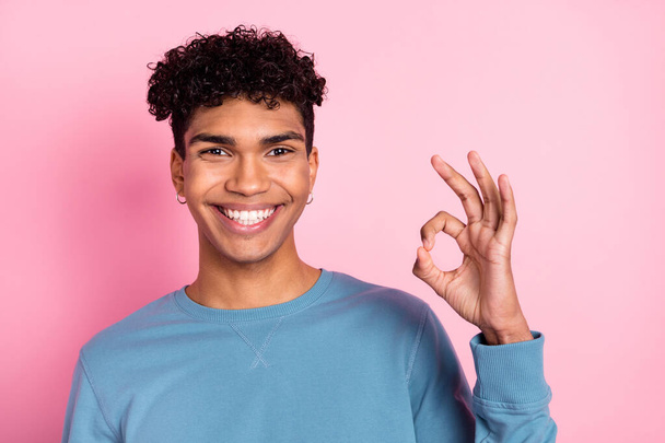Photo of young cheerful black man happy smile show okey sign ad recommend great isolated over pink color background - Фото, зображення