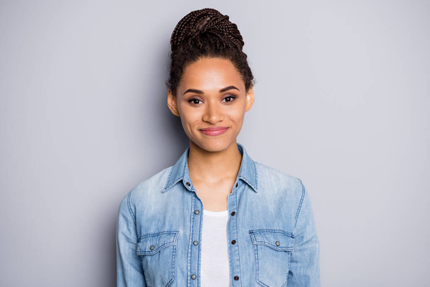 Photo portrait of girl with bun wearing jeans shirt smiling happy isolated on grey color background - Φωτογραφία, εικόνα
