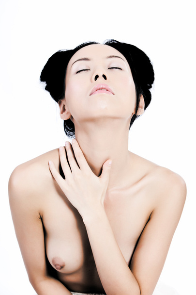 Sensual asian woman touching her body - 写真・画像