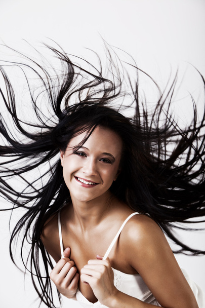 Portrait of your female flicking hair - Foto, Imagem