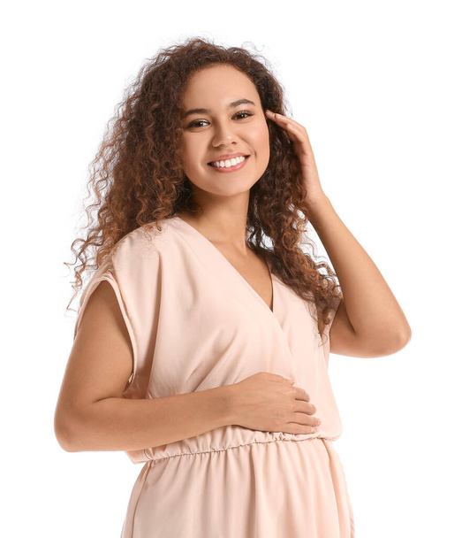 Beautiful pregnant African-American woman on white background - Fotografie, Obrázek