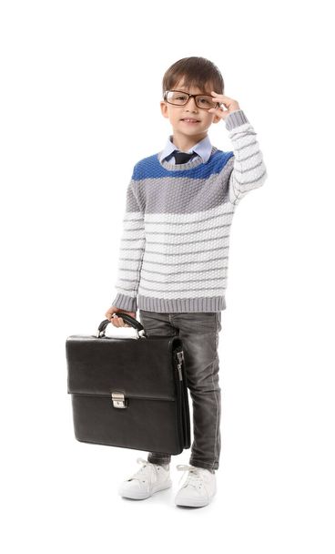 Cute little businessman with briefcase on white background - Foto, imagen