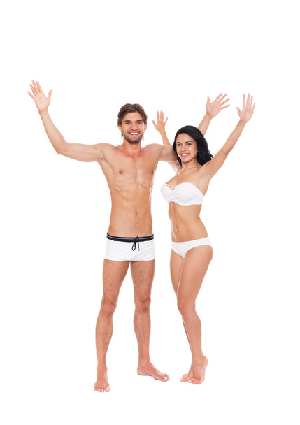 Excited couple in swimsuits - Φωτογραφία, εικόνα