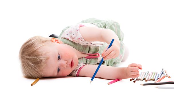 2 years old girl drawing with pencils. Isolated on white. - Φωτογραφία, εικόνα