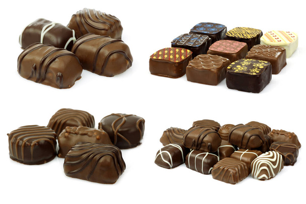 rozmanité zdobené luxusní čokoládové bonbony na bílém pozadí - Fotografie, Obrázek