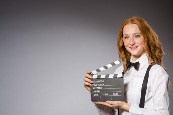 Woman with movie board - Photo, Image