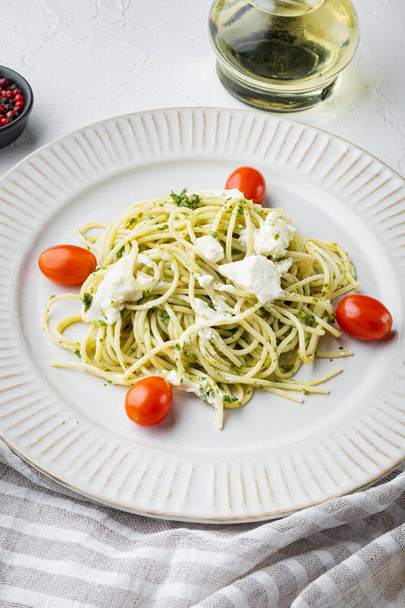 Vegan Zoodles with green pesto set, on plate, on white background - Photo, Image