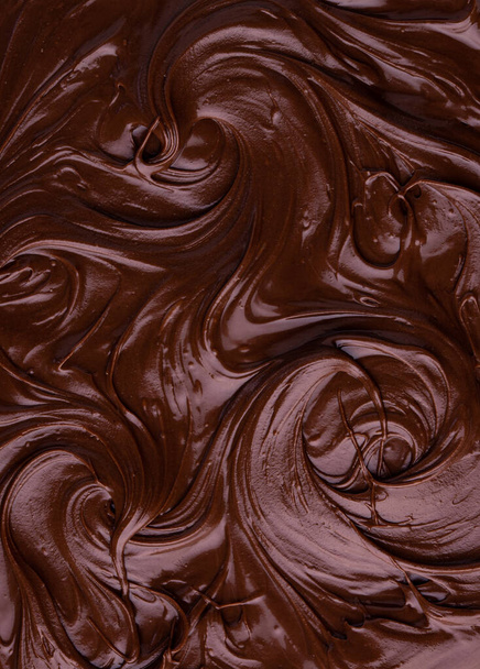 Potravinová textura roztavené čokolády nebo pomazánky. - Fotografie, Obrázek