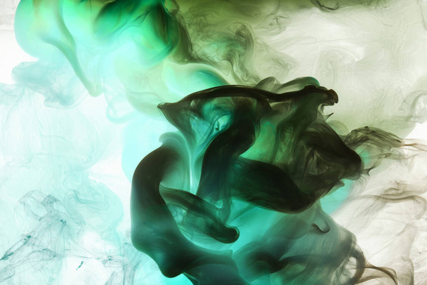 Green smoke cloud underwater background. Abstract swirling ocean, vibrant emerald color silk. Concept hookah, perfume, aroma wallpaper - Valokuva, kuva