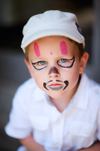 Small boy having his face painted as a pirate - Foto, immagini