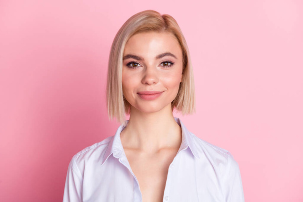 Photo of lovely charming young woman wear blue shirt blonde hair isolated on pastel pink color background - Zdjęcie, obraz