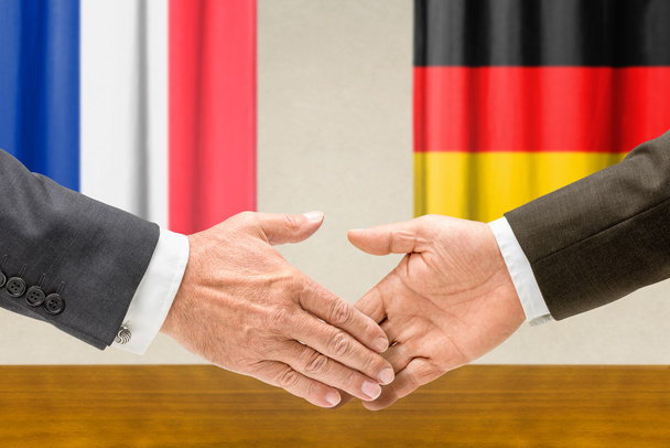 Franciaország és Németország képviselőinek kezet - Fotó, kép