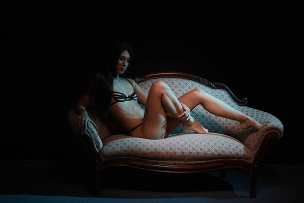 Photoshoot of A beautiful nude white model in a studio - Zdjęcie, obraz