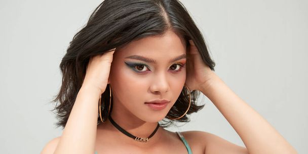 Fashion portrait of girl with bright make up looking at camera. - Foto, immagini