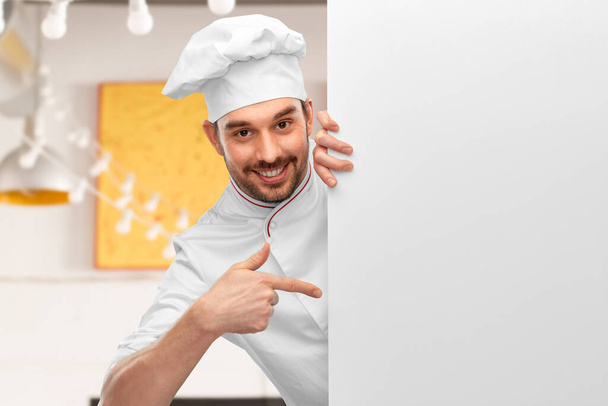 happy smiling male chef with big white board - 写真・画像