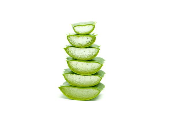 High Stacks of Aloe Vera in Bright Isolated White Background, Natural Fresh Lidah Buaya Ingredients for Beauty Product Image - Fotografie, Obrázek