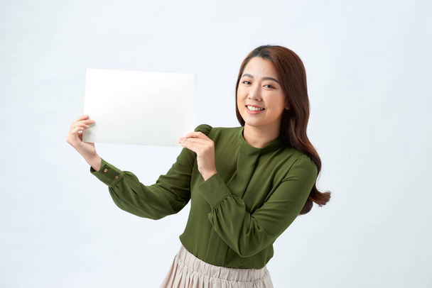 Girl student hold white blank board. White background young woman isolated. female model. - Photo, image