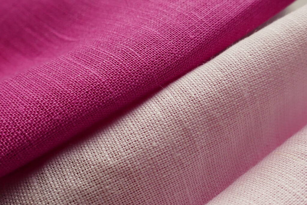 rolls of linen fabric of different colors. close up - Photo, Image