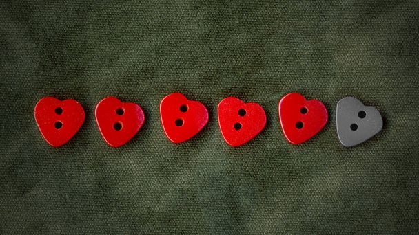 Heart line buttons sewing image. Life bar style romantic set. Symbol of love. Red buttons frame on fabric texture background wallpaper - Фото, изображение