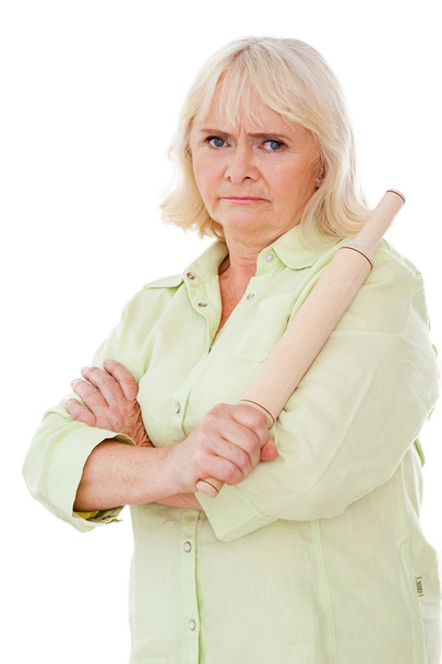 Femme âgée en colère tenant rouleau à pâtisserie
 - Photo, image