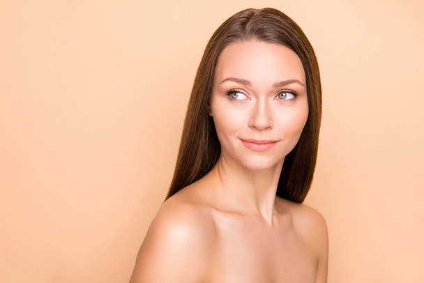Profile portrait of gorgeous young person look empty space smile wear nothing isolated on beige color background - Fotografie, Obrázek