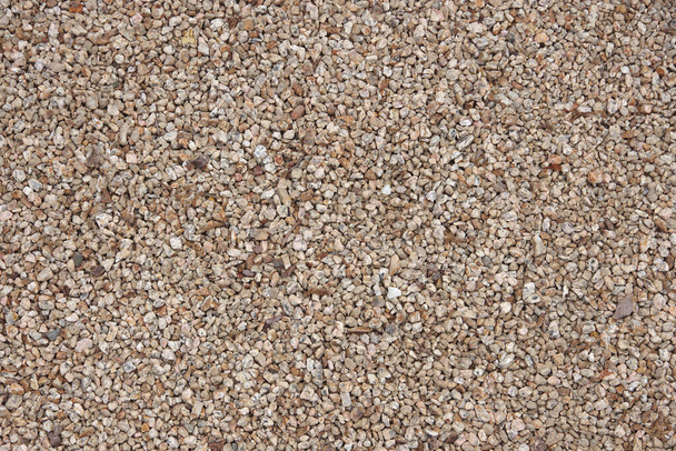 Pedras de cascalho marrom claro em uma visão de close-up de quadro completo de alto ângulo  - Foto, Imagem