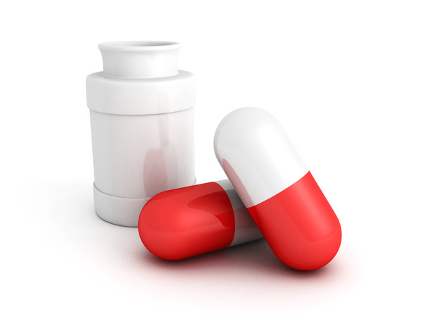 Medicine bottle and red pills - Фото, зображення