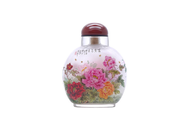 Antique snuff bottle isolated on white background.  Inside painted snuff bottle (Neihua-Biyanhu) with Peonies flowers and Butterflies, famous Chinese arts and crafts - Photo, Image