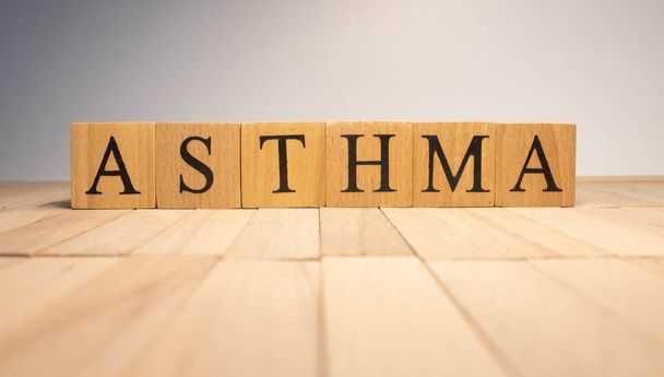 The word asthma was created from wooden cubes. Health and life. Close up. - Φωτογραφία, εικόνα