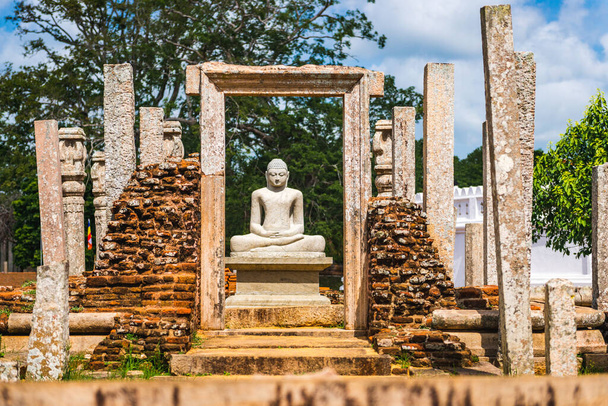 Anuradhapura, guardian statue at Thuparama Dagoba in the Mahavihara (The Great Monastery), Cultural Triangle of Sri Lanka - Photo, Image