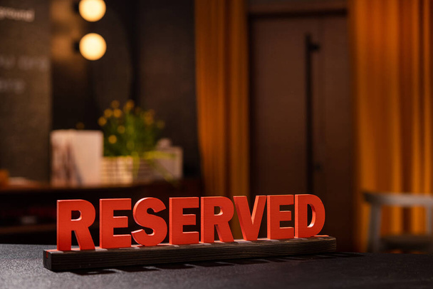 Reserved sign in hotel room. Accommodation booking concept. - Photo, Image