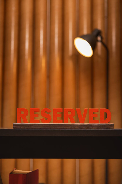 Reserved sign in hotel room. Accommodation booking concept. - Foto, imagen