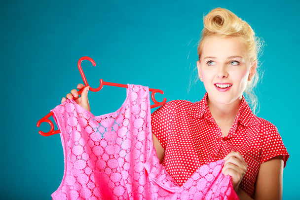 Pinup girl buying clothes pink dress. Sale retail. - Φωτογραφία, εικόνα