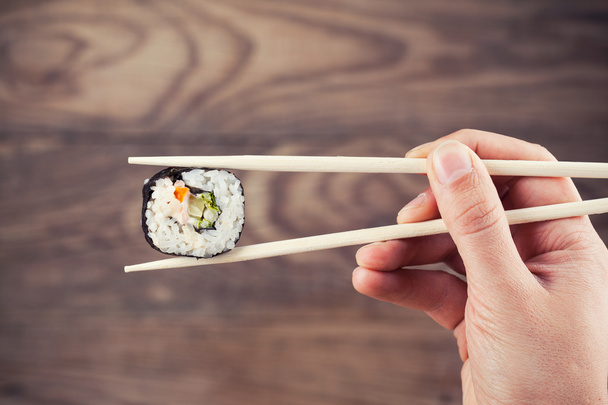 Hand sushi chopsticks - Foto, Imagem