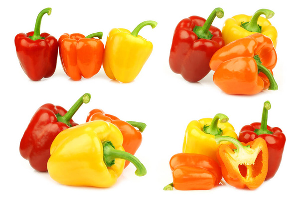 Červená, oranžová a žlutá paprika (capsicum) na bílém pozadí - Fotografie, Obrázek